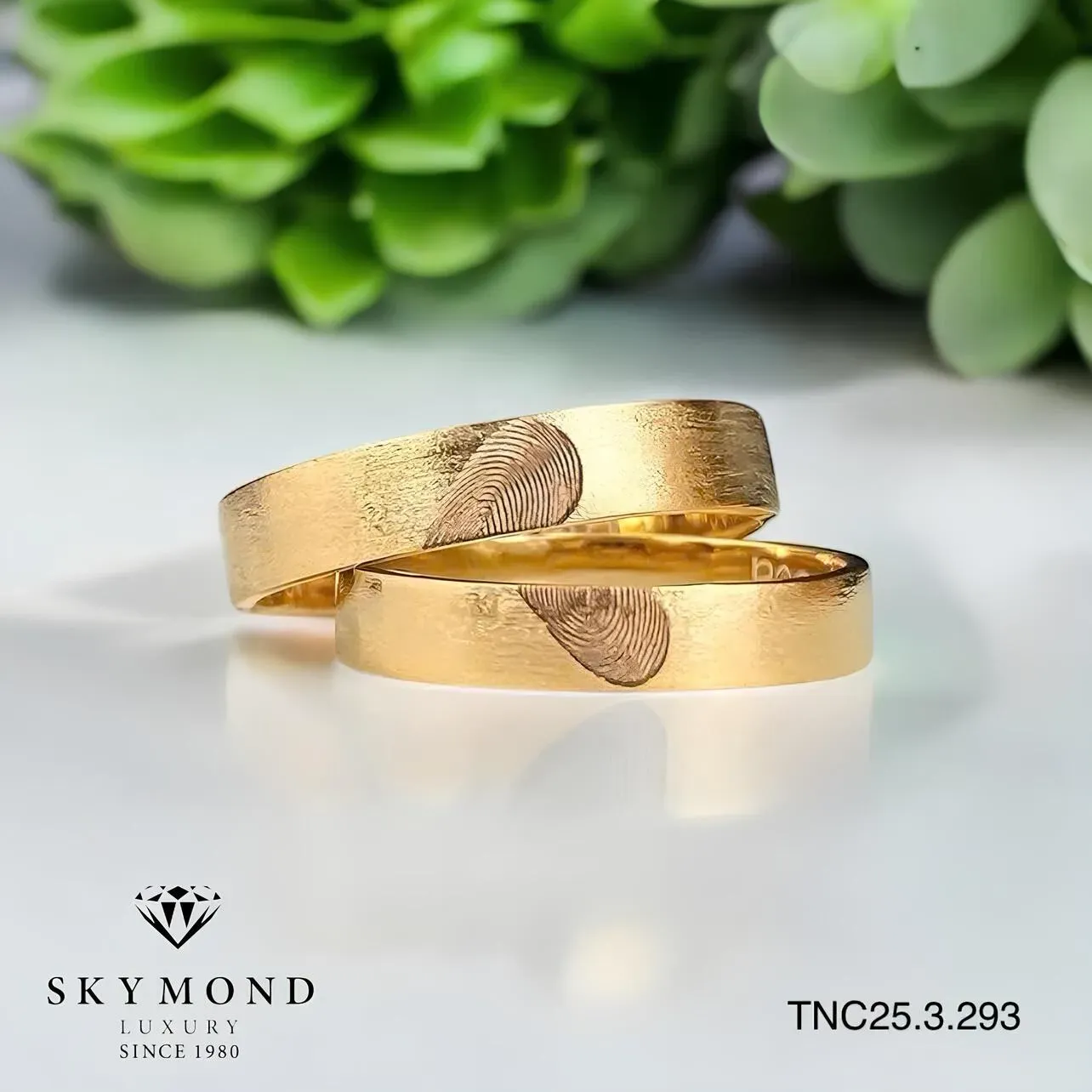 nhẫn cưới vàng trơn khắc trái tim